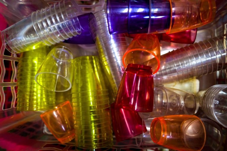 a close up shot of colorful shot glasses