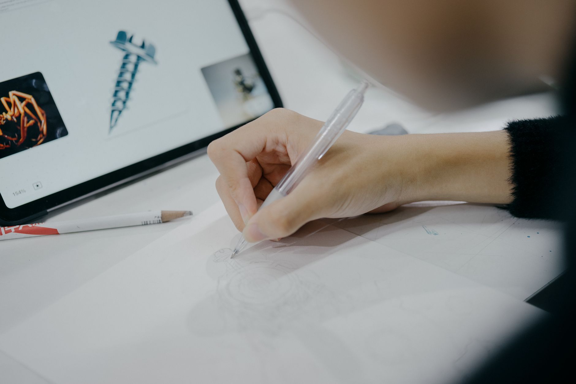 artist sketching in modern tokyo studio
